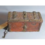An armada style antique iron strong box.