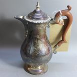 An early 20th Century London silver coffee pot,