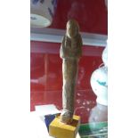 A ancient Egyptian wooden Shabti. New Kingdom, Ramesside period, circa 1295-1070 BC.