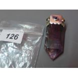 An impressive amethyst faceted point pendant,