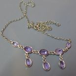 An silver and amethyst pendant necklace,