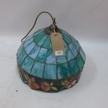 A Tiffany style blue leaded glass ceiling light with floral decoration.
