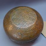 A 19th Century Islamic copped box and cover engraved with Arabic calligraphy,