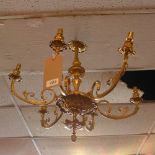 An 18th Century style gilt metal six branch chandelier together with three two branch wall lights