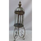 A gilt metal dome storm lantern on stand,