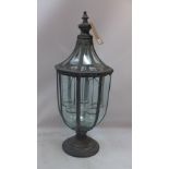 A octagonal metal storm lantern with five candle holders,