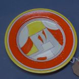 A Clarice Cliff hand painted plate with bizarre design,