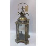 A gilt metal storm lantern with pierced decoration,