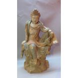 A 19th Century Chinese carved wooden statue of Guan Yin.