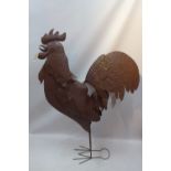 A large sheet metal model of a cockeral,