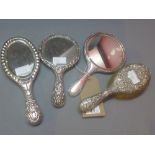 Three ladies silver ladies dressing table mirrors and one silver backed brush