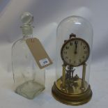 A collection of miscellaneous items to include an anniversary clock, glass decanter,