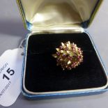 An 18ct yellow gold and ruby set pointed princess ring,