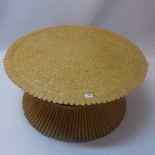 A circular wheat sheaf bamboo low table.