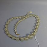 A 14ct yellow gold and glass beaded necklace