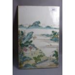 A 20th Century famille rose plaque depicting mountain scene