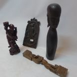 An African ironwood figure and early 19th Century carved oak plaque and two other carvings.