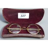A pair of Edwardian 9ct gold framed spectacles in original case.
