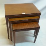 A nest of three mahogany tables.