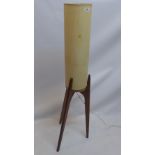 A mid 20th Century teak rocket lamp