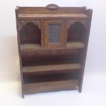 An Arts and Crafts oak open bookcase,