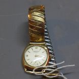 WITHDRAWN- A Freeson gold cased gentlemans wristwatch on a stainless steel and gold plated strap