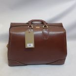 A 1940's brown leather Gladstone bag by Warren.