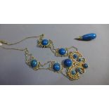 Silver and blue stone set drop necklace with filigree design