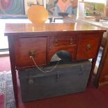 A Georgian mahogany sideboard with two drawers and one cupboard door raised on tapered legs,