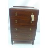 A mahogany chest of four drawers, raised on square legs.