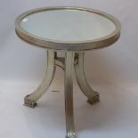 A contemporary silver gilt occasional table with mirrored top raised on three splayed legs,