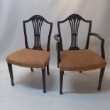 A set of six Hepplewhite style mahogany dining chairs to include two carvers.