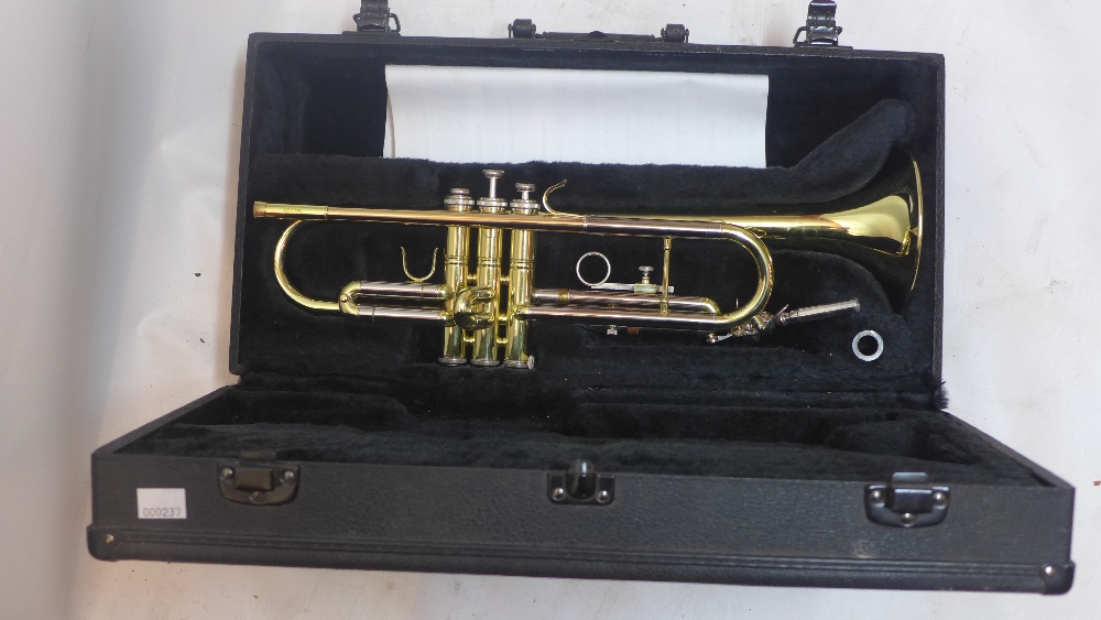 A cased Trumpet marked to mouthpiece Vincent Bach 1-1/4C and body of trumpet 75073 and ML 2