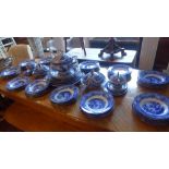 A large Royal Doulton dinner service with blue and white Geneva pattern to include tureens,