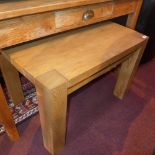 A large oak side table.