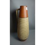 A mid 20th Century German ceramic vase with ribbed design.