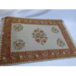 A Kelim rug with floral design