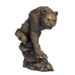 Sculpture, Bronze, A Bear sculpture seated upon a naturalistic base