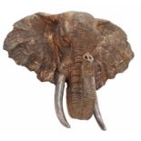 Sculpture, An African Elephant Head cast in bronze with tusks and trunk outstretched