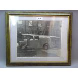 A framed and glazed vintage photograph of a London fire brigade truck.