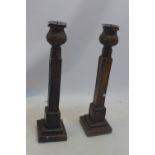 A pair of painted plaster pricket sticks in the 18th century taste.