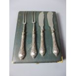 A cased set of German silver handled forks and knifes.