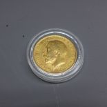A 22ct gold sovereign dated 1915