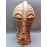 An early 20th century Congolese tribal mask. H.