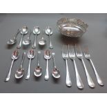 A silver bon bon dish, Birmingham mark and a large collection of Walker and Hall silver cutlery,