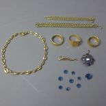 A collection of gold including 9ct chains and a horn of plenty,