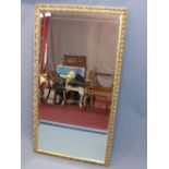 A 20th Century gilt framed mirror with bevelled glass plate