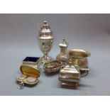 A collection of silver to include a coin case and cruet set, Sheffield and Birmingham. Approx.
