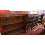 A Georgian style mahogany breakfront bookcase with central leaded glass doors,