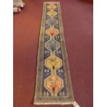 A fine North West Persian Ardebil runner, 318cm x 60cm,